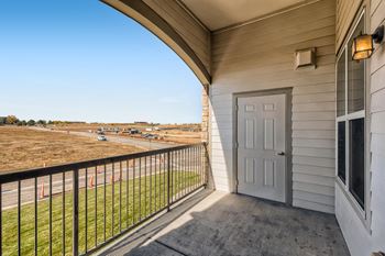 A balcony with extra storage at Fox Run Lofts Apartments, Englewood CO.